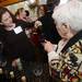 Nicole Adelman pours Hannah Donigan a glass of wine at Dining for Dollars fundraiser for HARC at Zingerman's Roadhouse on Wednesday.  Melanie Maxwell I AnnArbor.com